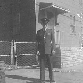 Pecora, Phil
Phil Pecora. April of 1962. Was home on leave before being shipped out to Germany. This was in front of my house at 168 E.Kinney.

