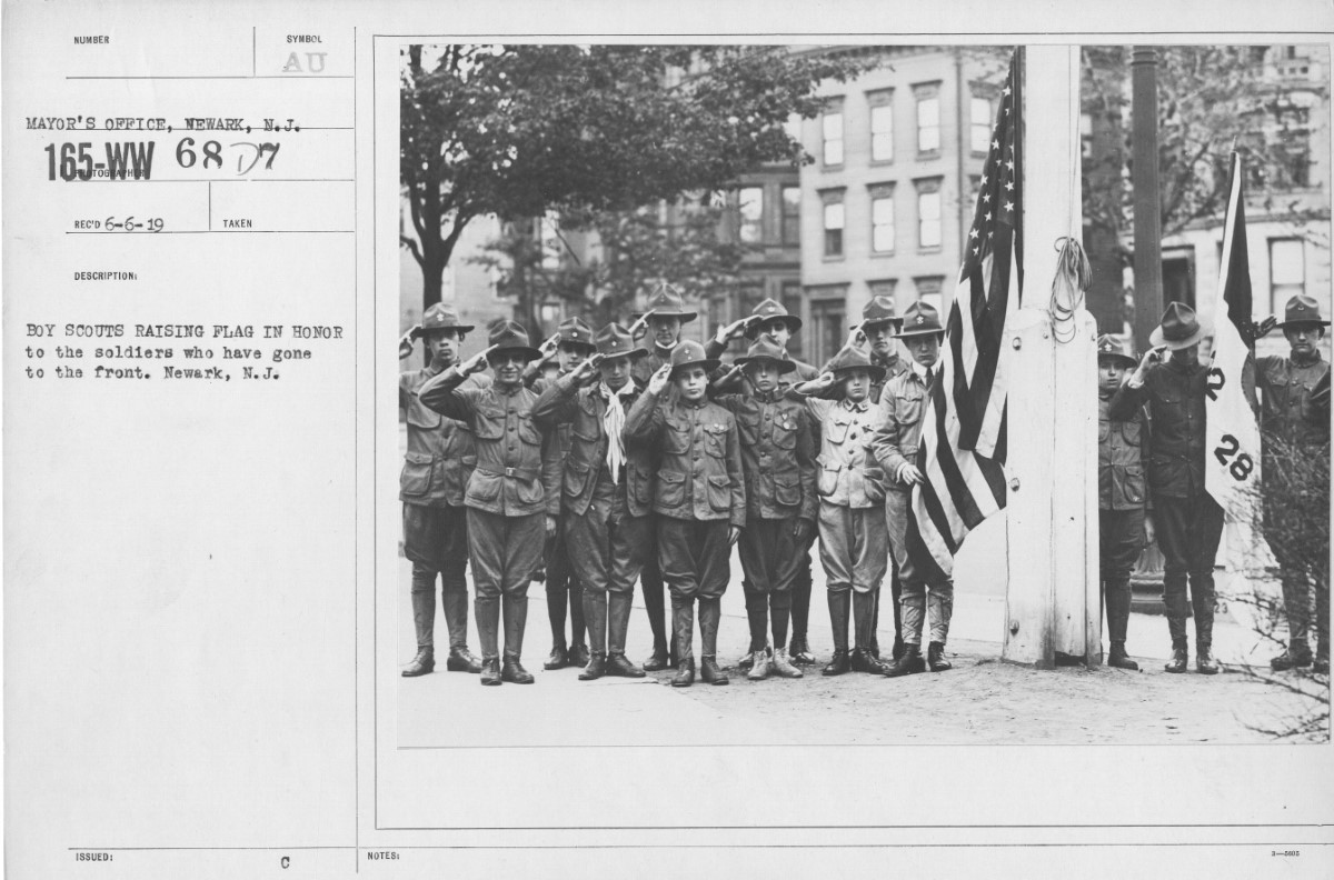 Boy Scouts Raising Flag
