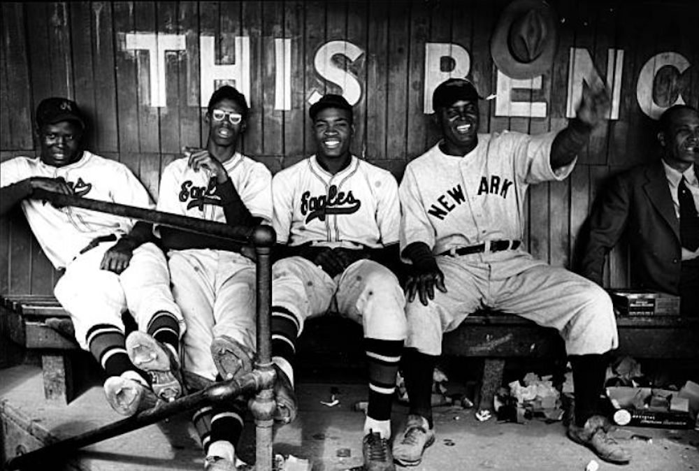 JUNE 1939: Negro League Baseball: Portrait of Newark Eagles (L-R) pitcher Leniel Hooker, All Star pitcher Max Manning, pitcher Jim Brown, Raleigh Biz Mackey & unidentified executive. (Photo by Aral/Pix Inc./The LIFE Picture Collection/Getty Images)
