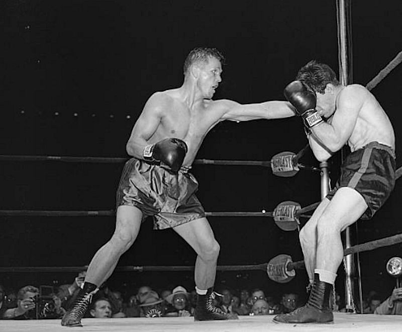 Zale, Tony & Rocky Graziano
6/10/1948-Newark, NJ- Tony Zale of Gary, Indiana sends a left hook to the head, which knocked out Rocky Graziano of New York, in the third round of their scheduled 15-round middleweight title bout in Ruppert Stadium. 

Photo from Bettmann
