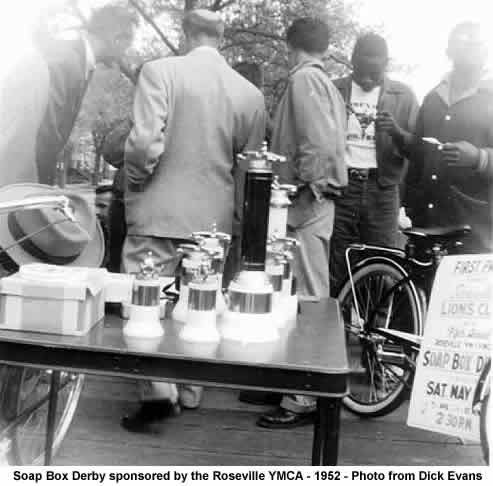 Soap Box Derby 1952
the prize table before that race. On the far left is Bob Cole. The young boys on the right are Leon Scott and Calyue Perry, students at Roseville Avenue School.  The First Prize Bicycle was donated by the Roseville Lions Club
The races were covered by both The Newark Sunday News & Star Ledger.
