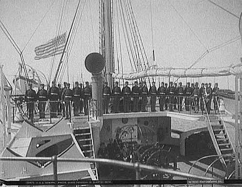 Marine guard parading on quarter deck
"Only one commissioned ship of the United States Navy has borne the name Newark, after the town of Newark, New Jersey; the protected cruiser Newark (Cruiser No. 1).
Photo from Rich Olohan"

