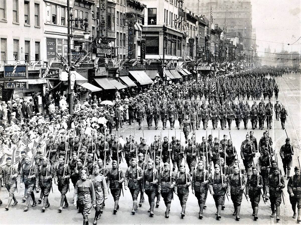 312th Infantry Returning
"Here is the photo of the returning troops, from the 312th Infantry Regiment, marching in Newark in 1919. You can tell whether soldiers are coming or going by their hats. These men have the overseas cap, which means they are returning. Soldiers went overeseas with the wide brimmed campaign hat, which proved unusable overseas. These men are also carrying the US Model 1917 rifle, rather than the Model 1903 Springfield. The 1917, originally a British pattern, was manufactured in the US and converted to the US 
