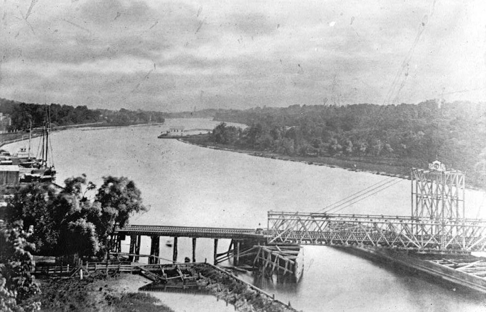 1875
This is the Erie RR Bridge spanning the Passaic River looking north just south of where the Clay Street Bridge stands today. 
